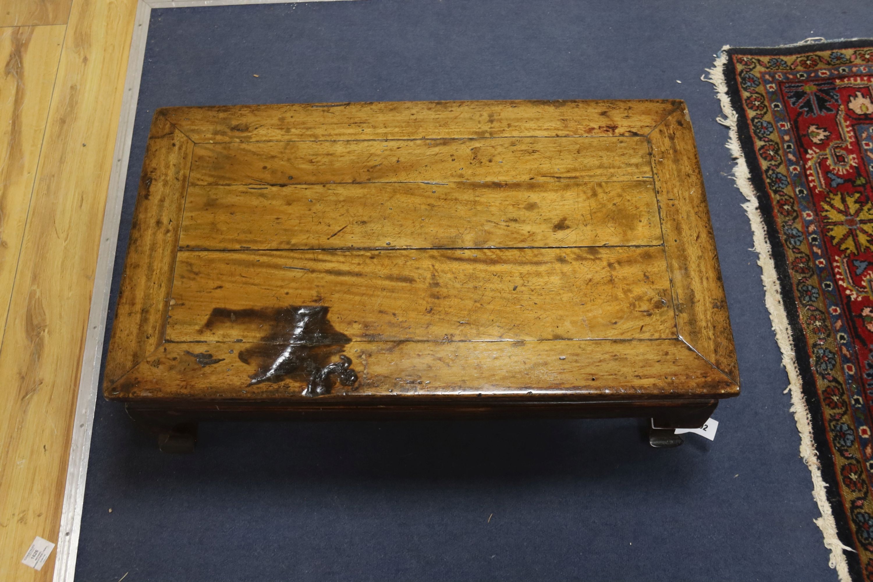 A 19th century Chinese wood Kang table, width 78cm, depth 46cm, height 27cm